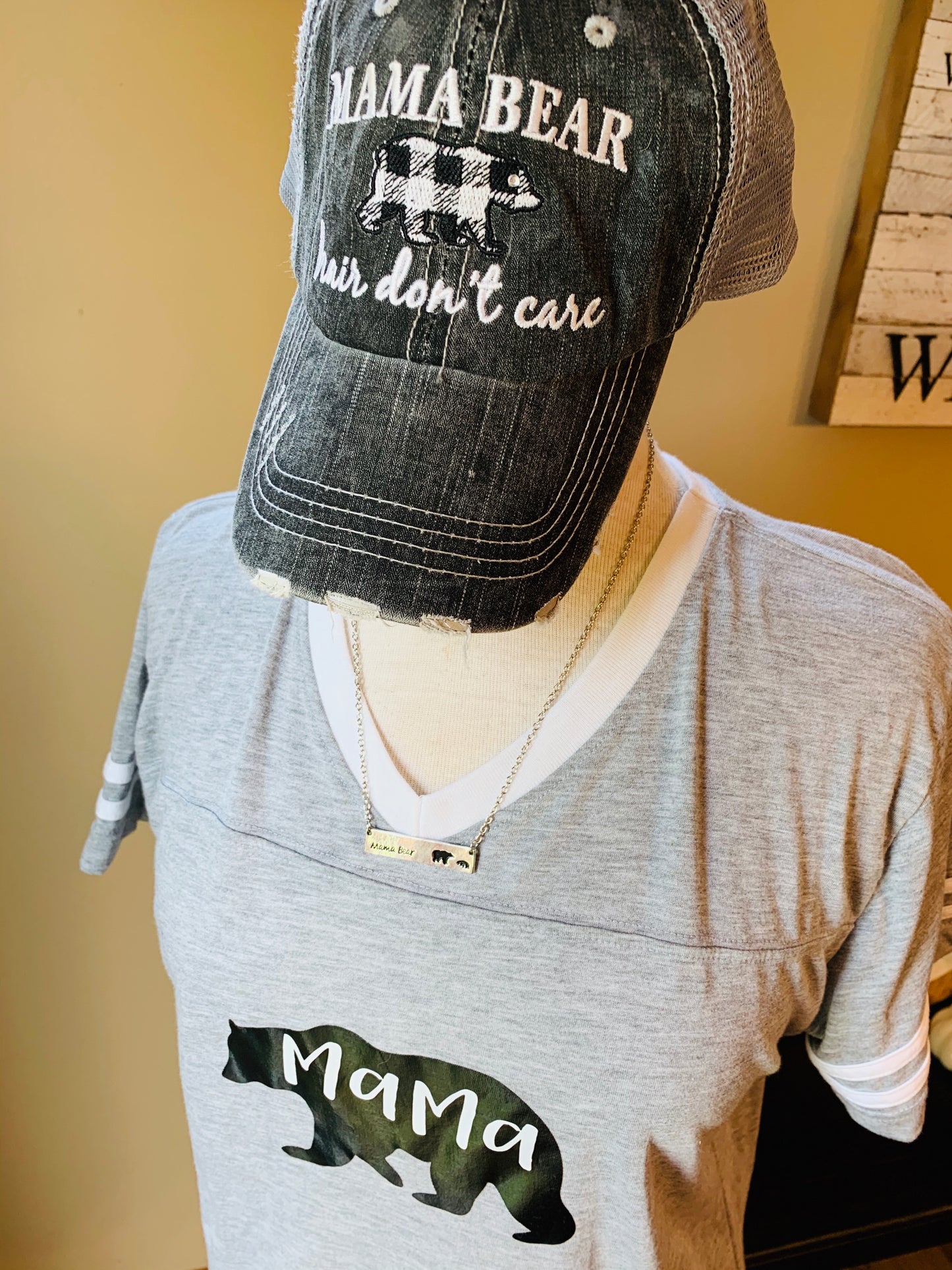 Hats, shirts, necklaces { Mama bear hair don't care. Gray with black and white buffalo plaid bear. Embroidered. Necklaces silver with option of bears. T-shirts XS - XL. - Stacy's Pink Martini Boutique