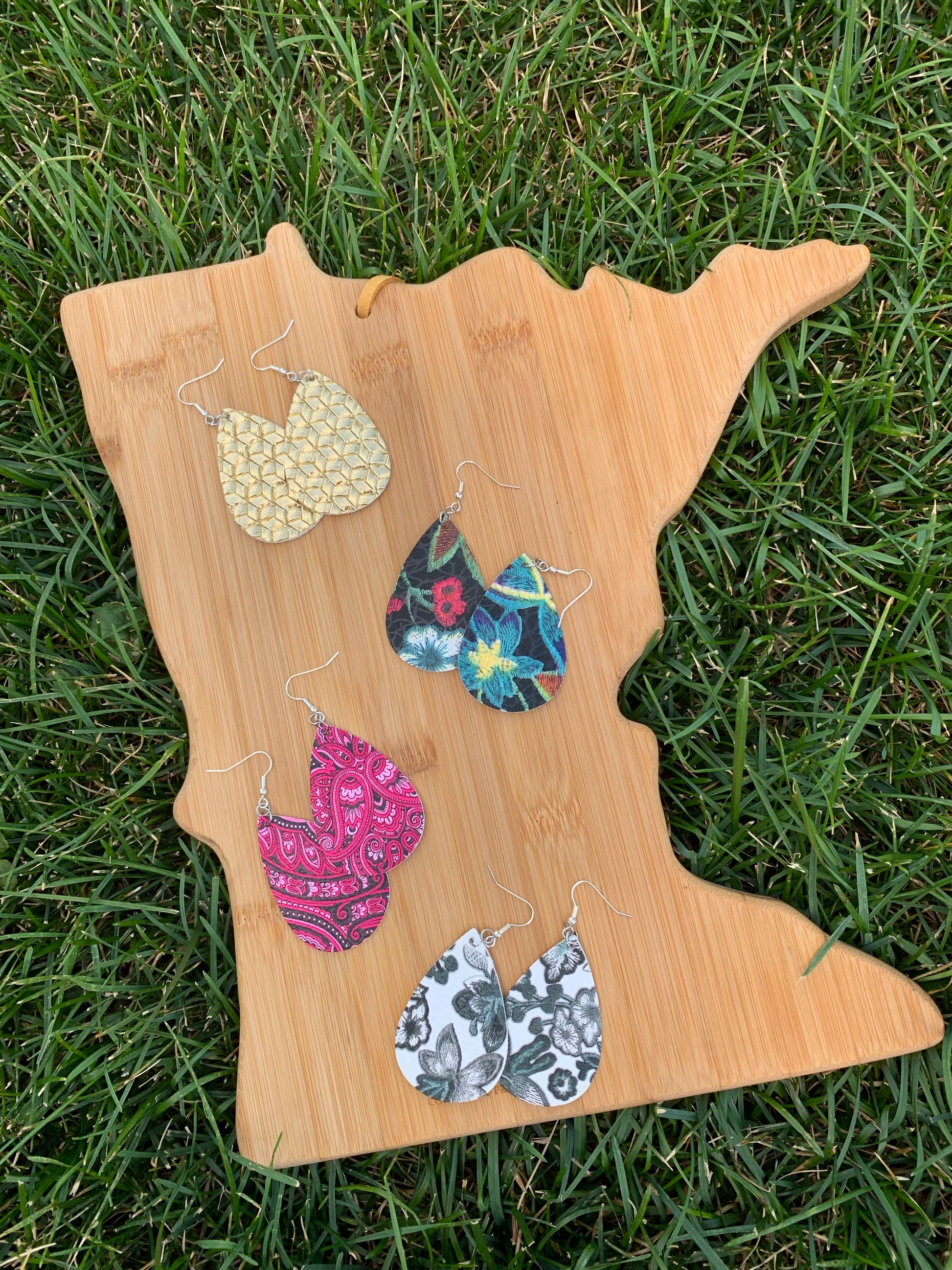 Earrings { Leather } Football. Buffalo plaid. Glitter. Basketball. Baseball. Volleyball. Paisley. Floral. Leopard. Rainbow. Giraffe. $5 jewelry! - Stacy's Pink Martini Boutique