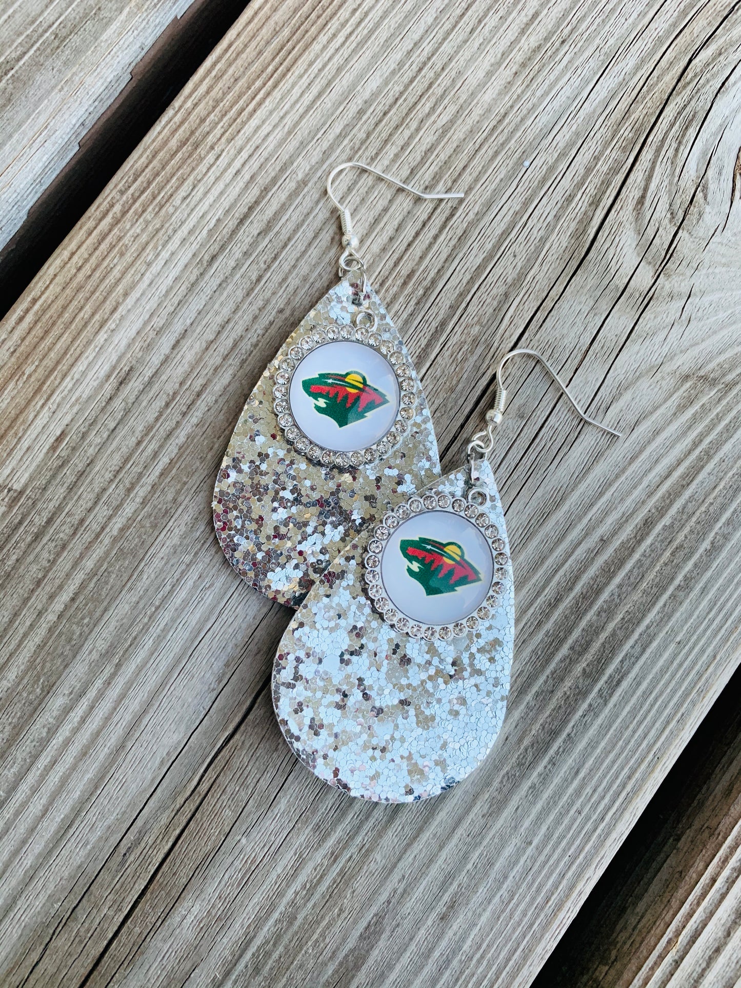 Earrings { Leather } Football. Buffalo plaid. Glitter. Basketball. Baseball. Volleyball. Paisley. Floral. Leopard. Rainbow. Giraffe. $5 jewelry! - Stacy's Pink Martini Boutique