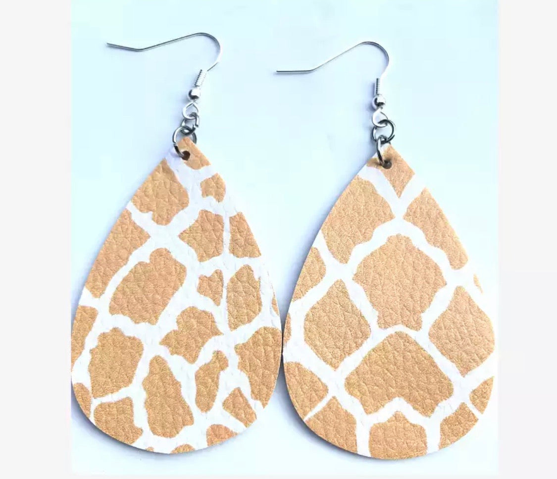 Earrings { Leather } Football. Buffalo plaid. Glitter. Basketball. Baseball. Volleyball. Paisley. Floral. Leopard. Rainbow. Giraffe. $5 jewelry! - Stacy's Pink Martini Boutique
