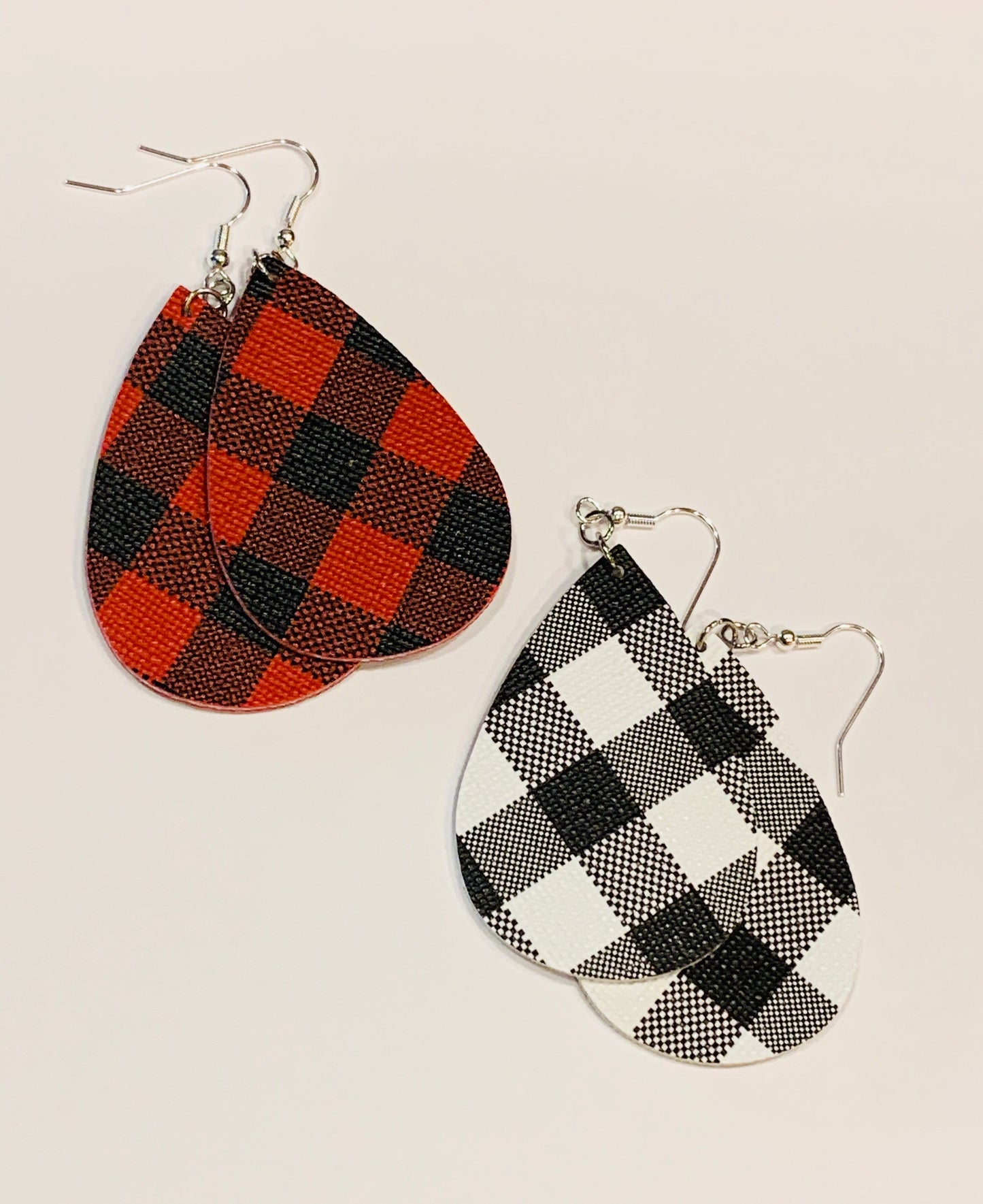 Earrings { Leather } Football. Buffalo plaid. Glitter. Basketball. Baseball. Volleyball. Paisley. Floral. Leopard. Rainbow. Giraffe. $5 jewelry! - Stacy's Pink Martini Boutique