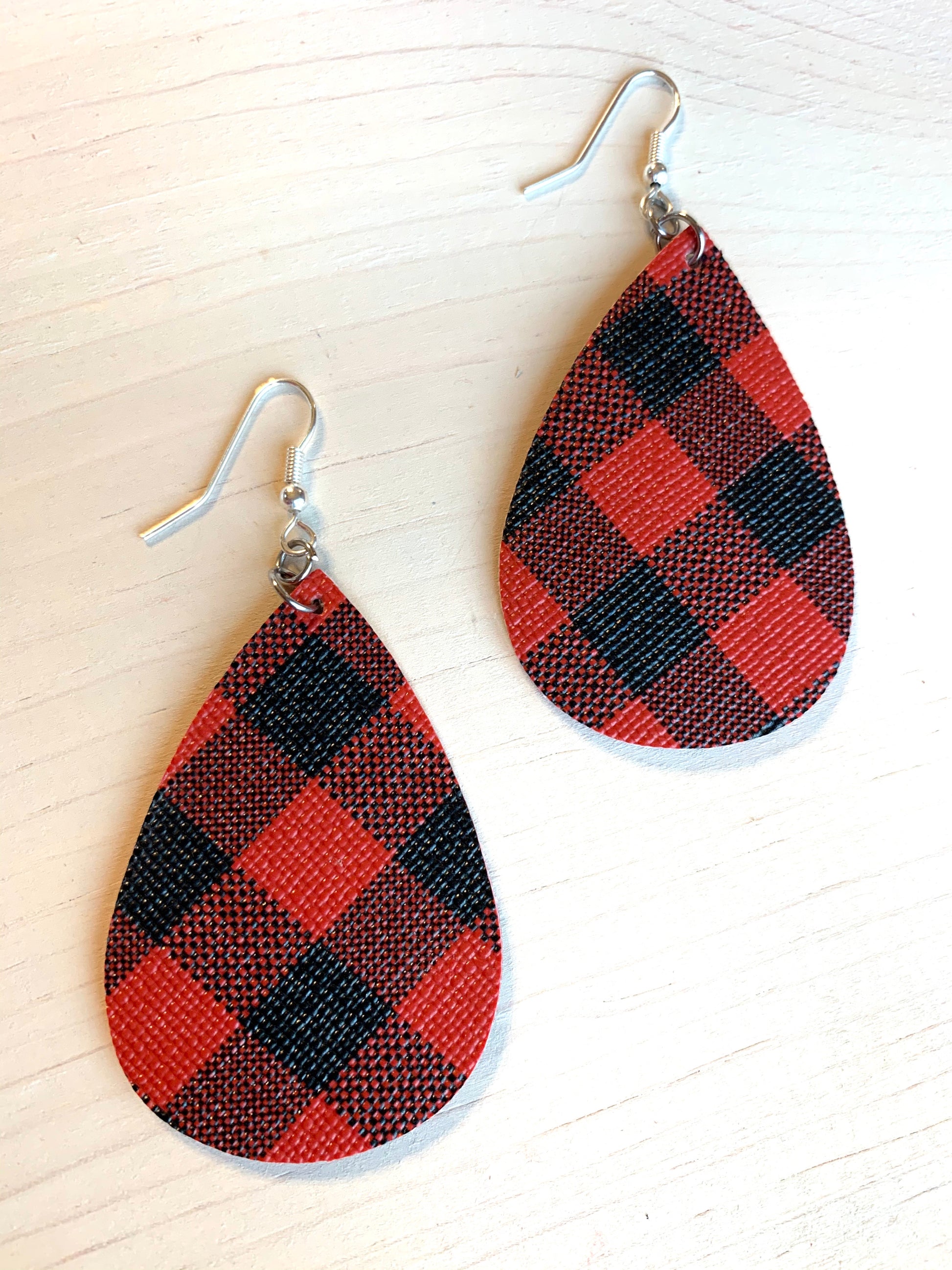Earrings { Leather } Football. Buffalo plaid. Glitter. Basketball. Baseball. Volleyball. Paisley. Floral. Leopard. Rainbow. Giraffe. $5 jewelry! - Stacy's Pink Martini Boutique