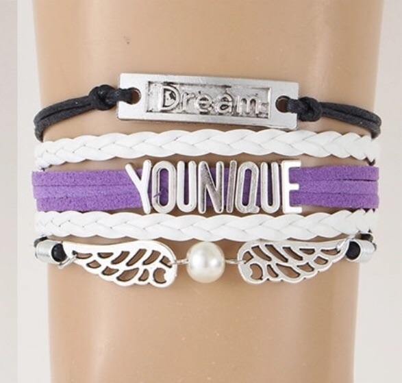 Bracelet { Younique } Wings. Dream. 1 grey/white. 1 purple/white. $5 - Stacy's Pink Martini Boutique