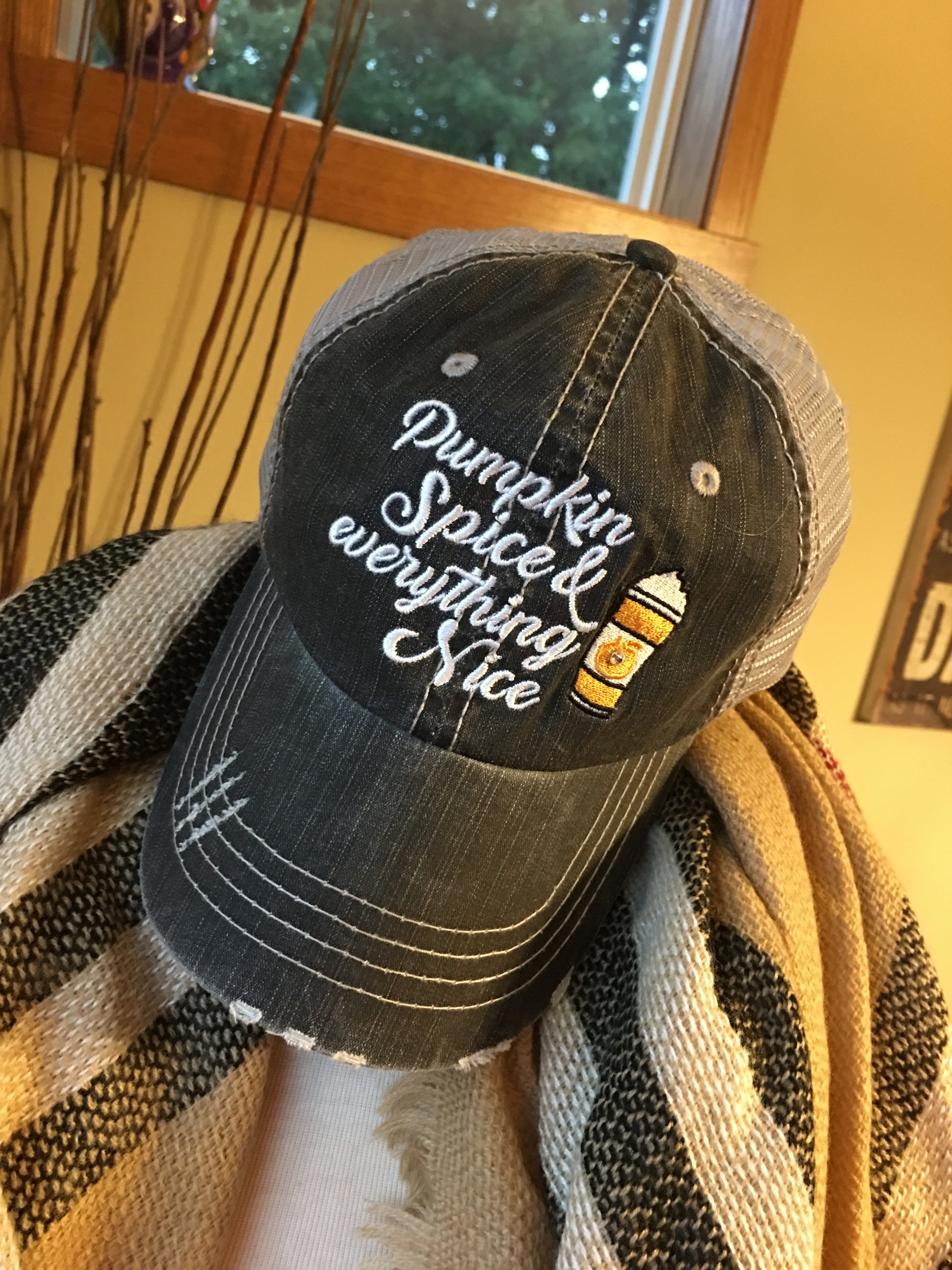 Hats { Pumpkin spice and everything nice } Pumpkin spice and Jesus. Pumpkin spice and chill. 3 sayings in 3 colors. Embroidered distressed trucker cap. Black suede. Black and white herringbone. Blanket Scarf. Plaid. - Stacy's Pink Martini Boutique