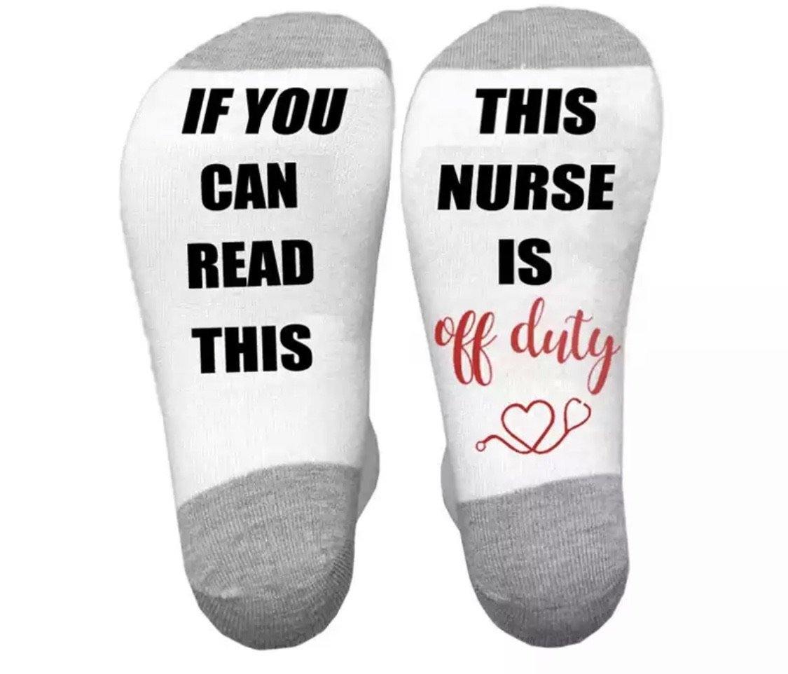 Socks { if you can read this this teacher is off duty } Gray, white with black and red graphics. Heart. NURSE or TEACHER. - Stacy's Pink Martini Boutique