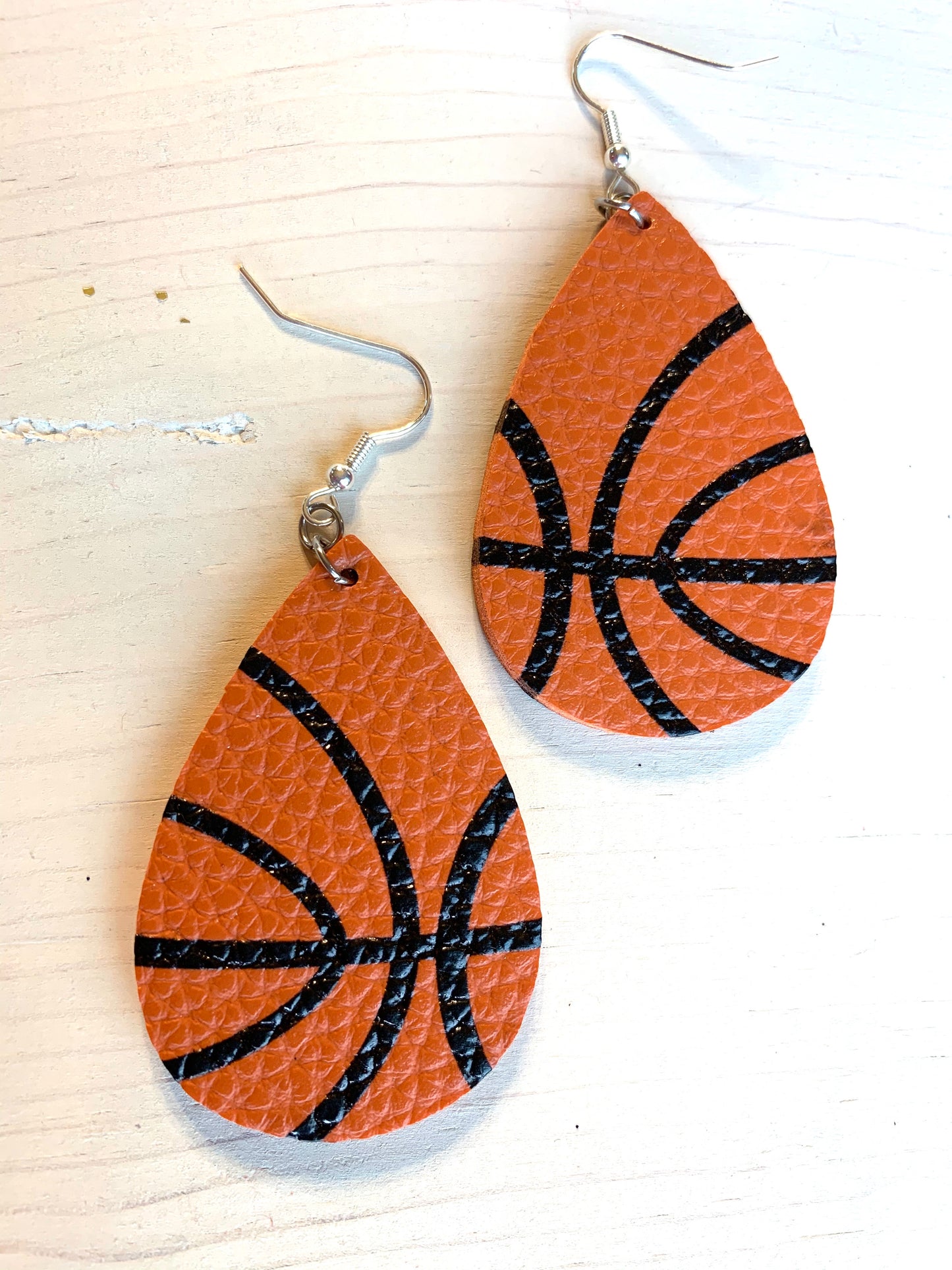 Earrings { Leather } Football. Buffalo plaid. Glitter. Basketball. Baseball. Volleyball. Paisley. Floral. Leopard. Rainbow. Giraffe. $5 jewelry! - Stacy's Pink Martini Boutique