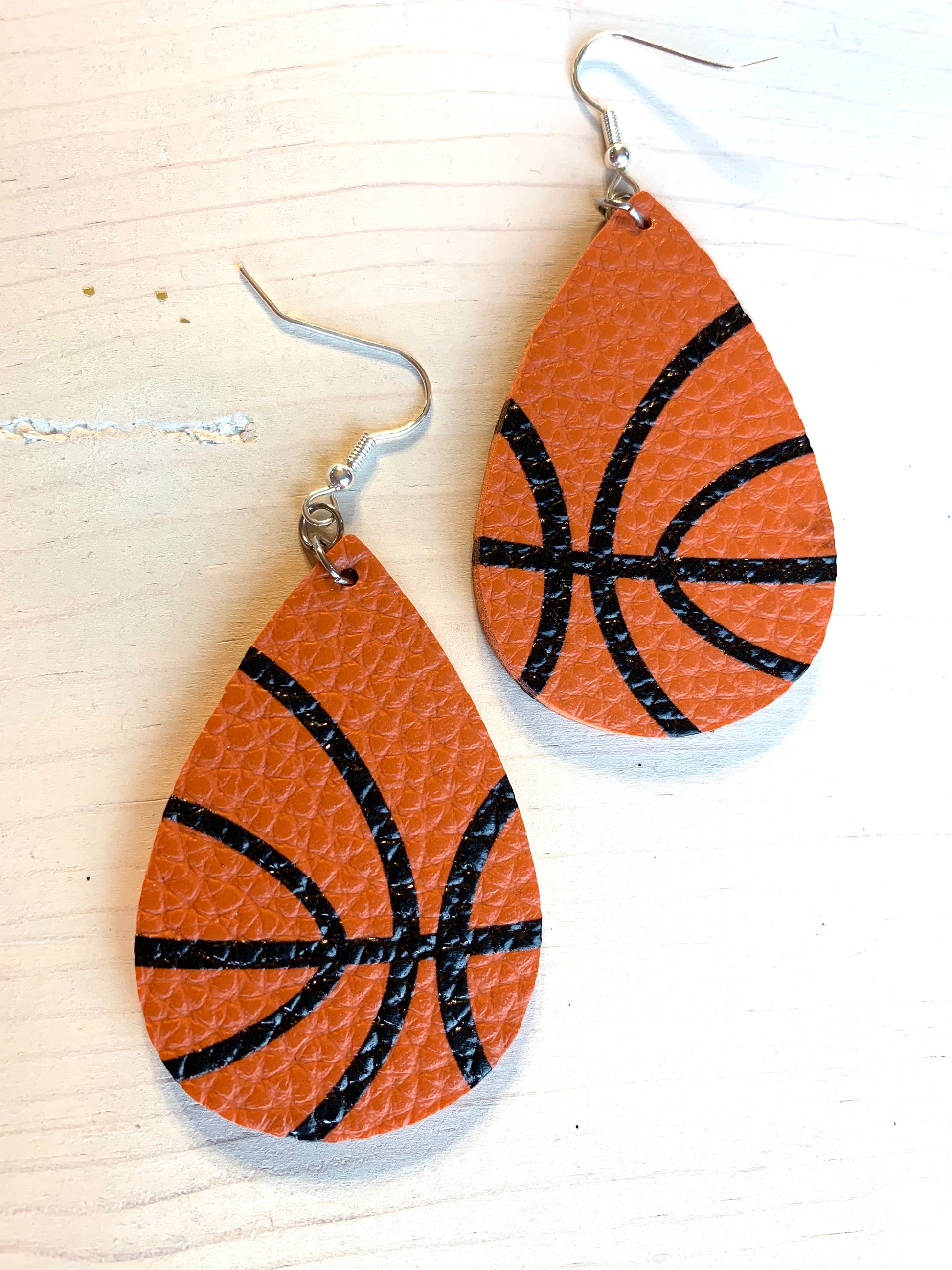 Earrings { Leather } Football. Buffalo plaid. Glitter. Basketball. Baseball. Volleyball. Paisley. Floral. Leopard. Rainbow. Giraffe. $5 jewelry! - Stacy's Pink Martini Boutique