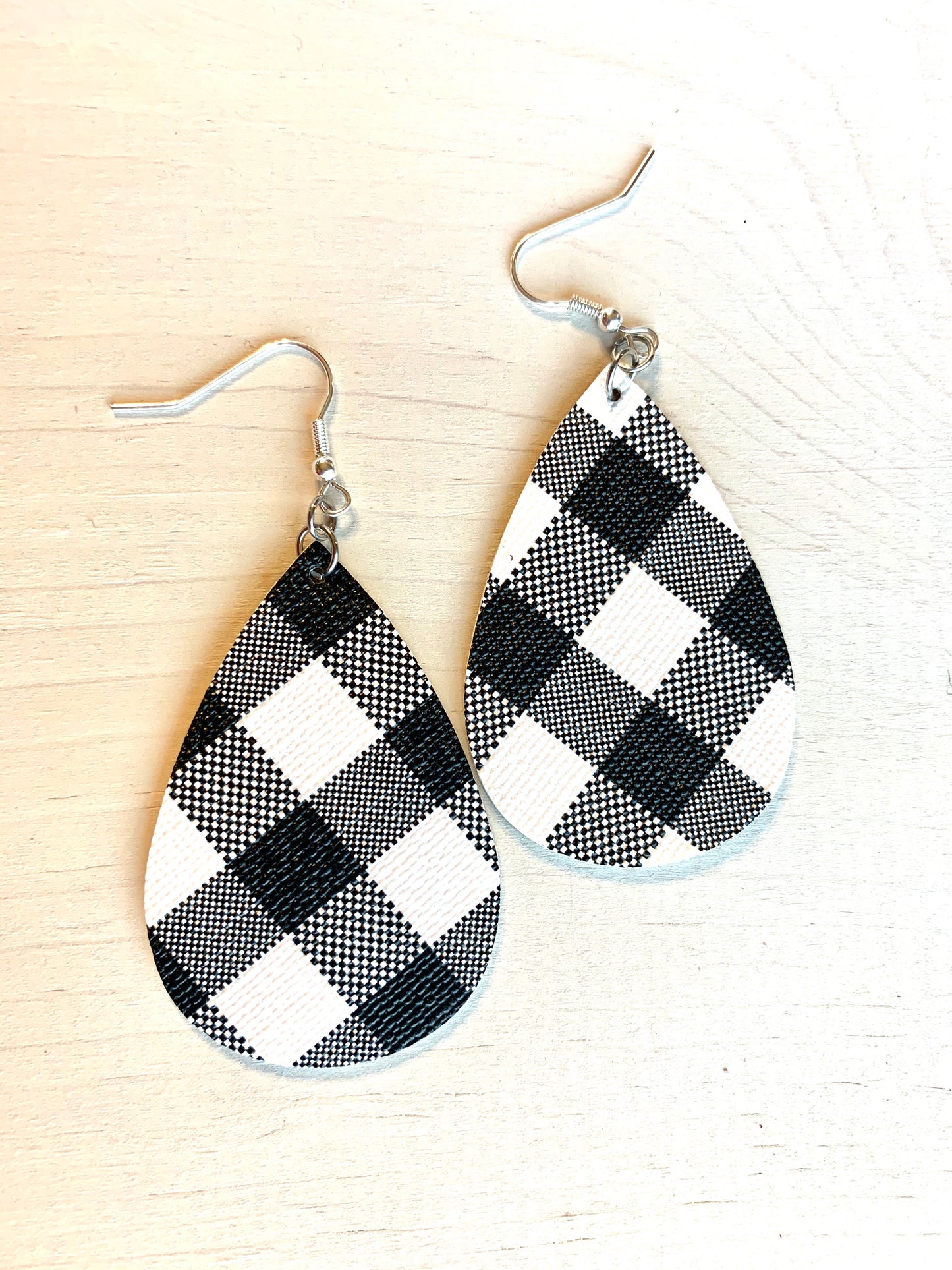 Earrings { Leather } Football. Buffalo plaid. Glitter. Basketball. Baseball. Volleyball. Paisley. Floral. Leopard. Rainbow. Giraffe. $5 jewelry! - Stacy's Pink Martini Boutique
