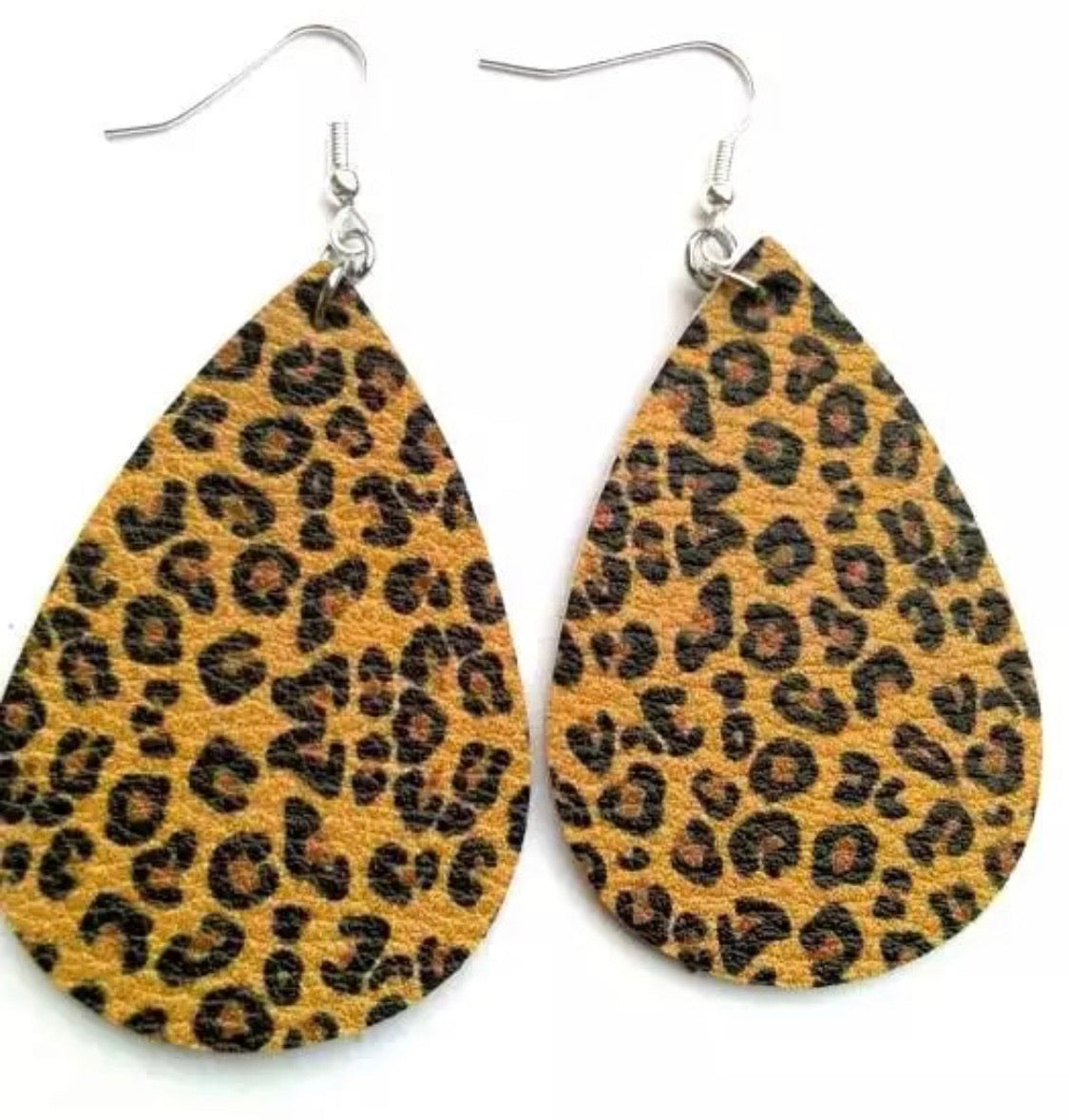Earrings { Leather } Football. Buffalo plaid. Glitter. Basketball. Baseball. Volleyball. Paisley. Floral. Leopard. Rainbow. Giraffe. $5 jewelry! - Stacy's Pink Martini Boutique