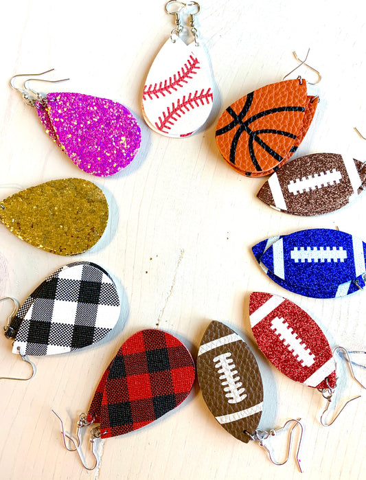 Earrings { Leather } Football. Buffalo plaid. Glitter. Basketball. Baseball. Volleyball. Paisley. Floral. Leopard. Rainbow. Giraffe. $5 jewelry! - Stacy's Pink Martini Boutique