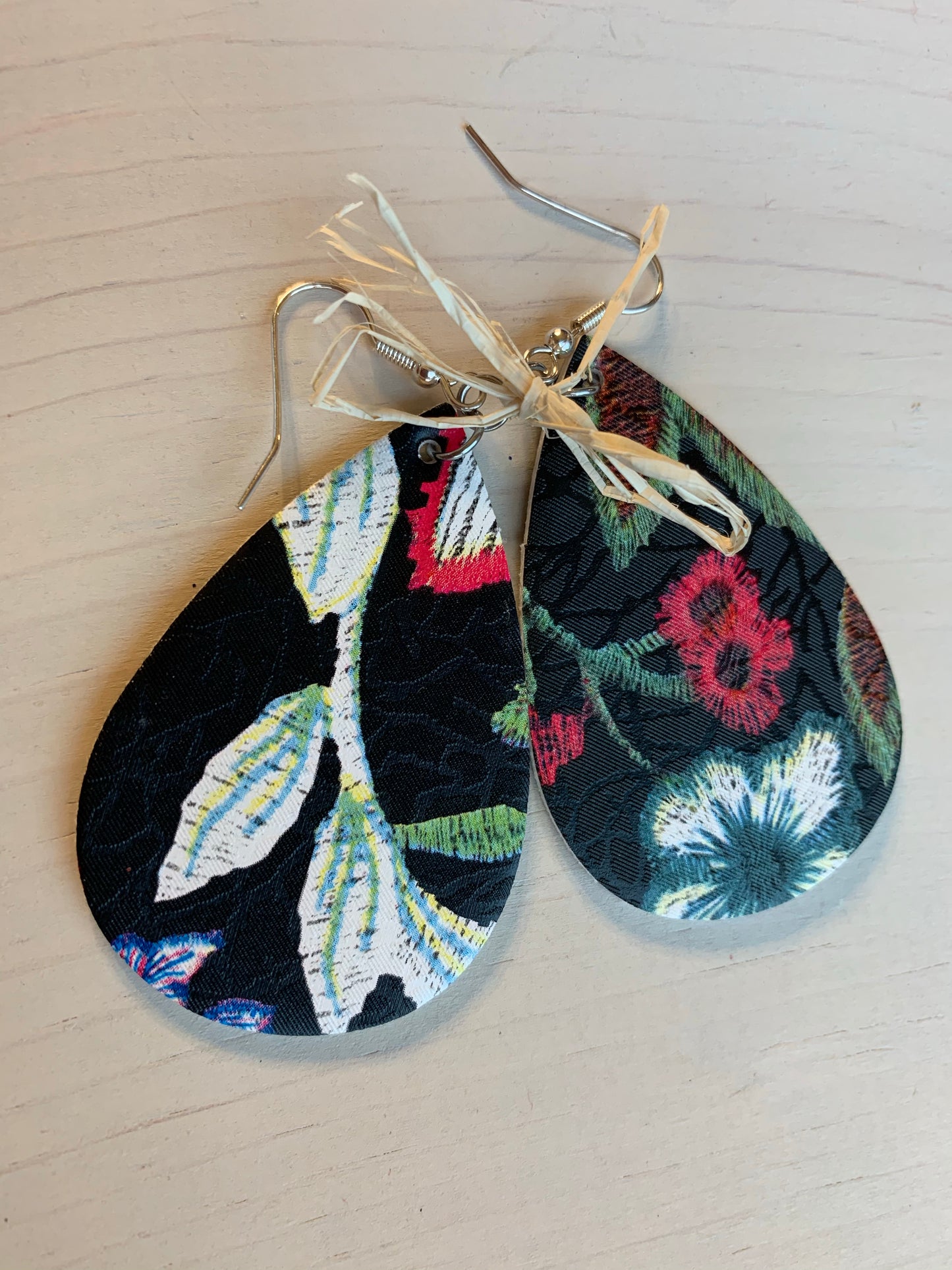 Earrings { Leather } Football. Buffalo plaid. Glitter. Basketball. Baseball. Volleyball. Paisley. Floral. Leopard. Rainbow. Giraffe. $5 jewelry! - Stacy's Pink Martini Boutique