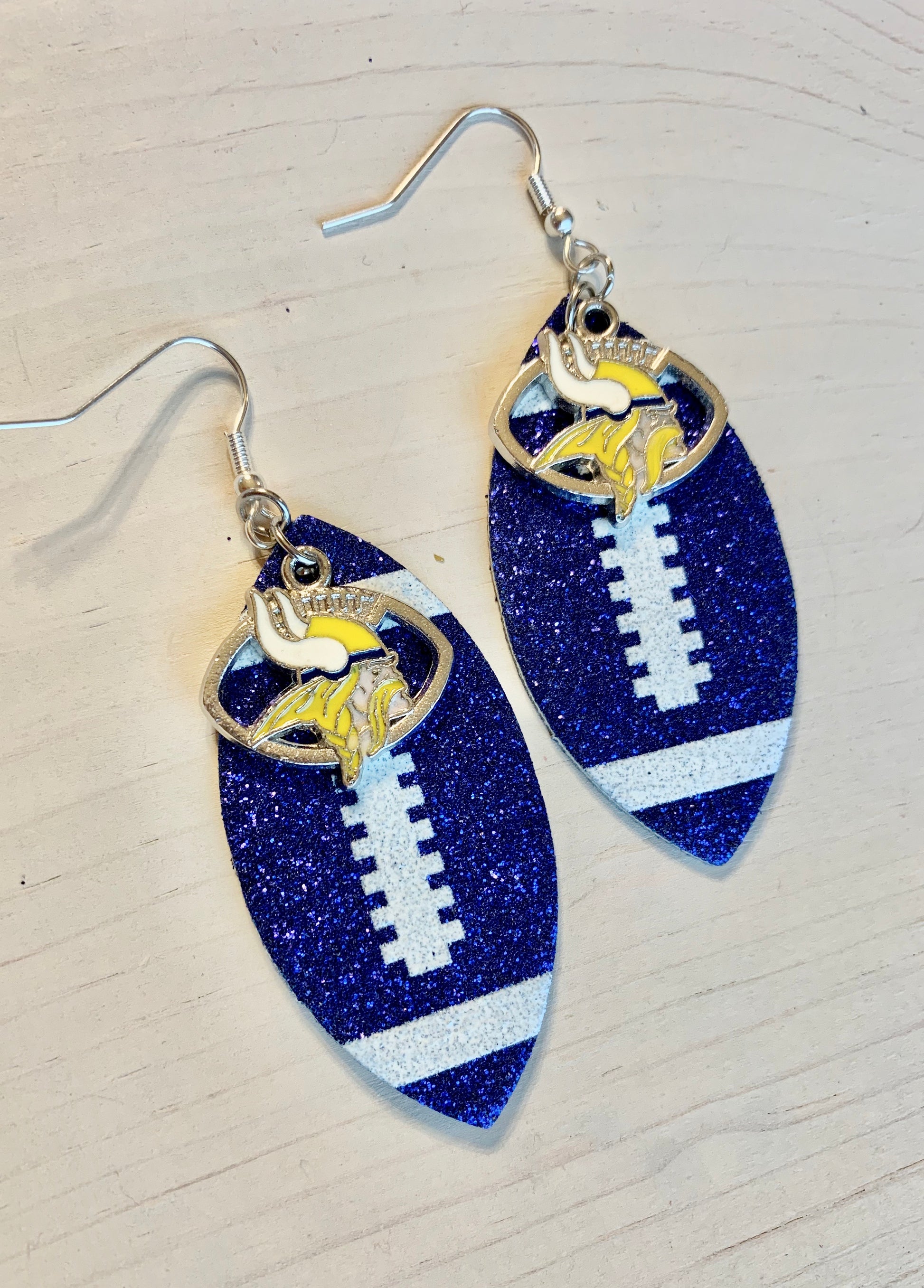 Earrings { Leather } Football. Buffalo plaid. Glitter. Basketball. Baseball. Volleyball. Paisley. Floral. Leopard. Rainbow. Giraffe. $5 jewelry! - Stacy's Pink Martini Boutique