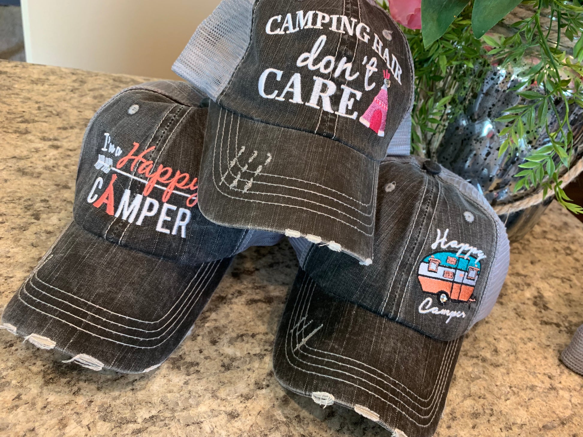 Hats or tanks { I'M A HAPPY CAMPER } { Camping hair don’t care } { Camping life } { Glamping hair don’t care } Embroidered distressed gray unisex trucker caps. Adjustable Velcro and hole for pony. RV there yet? - Stacy's Pink Martini Boutique