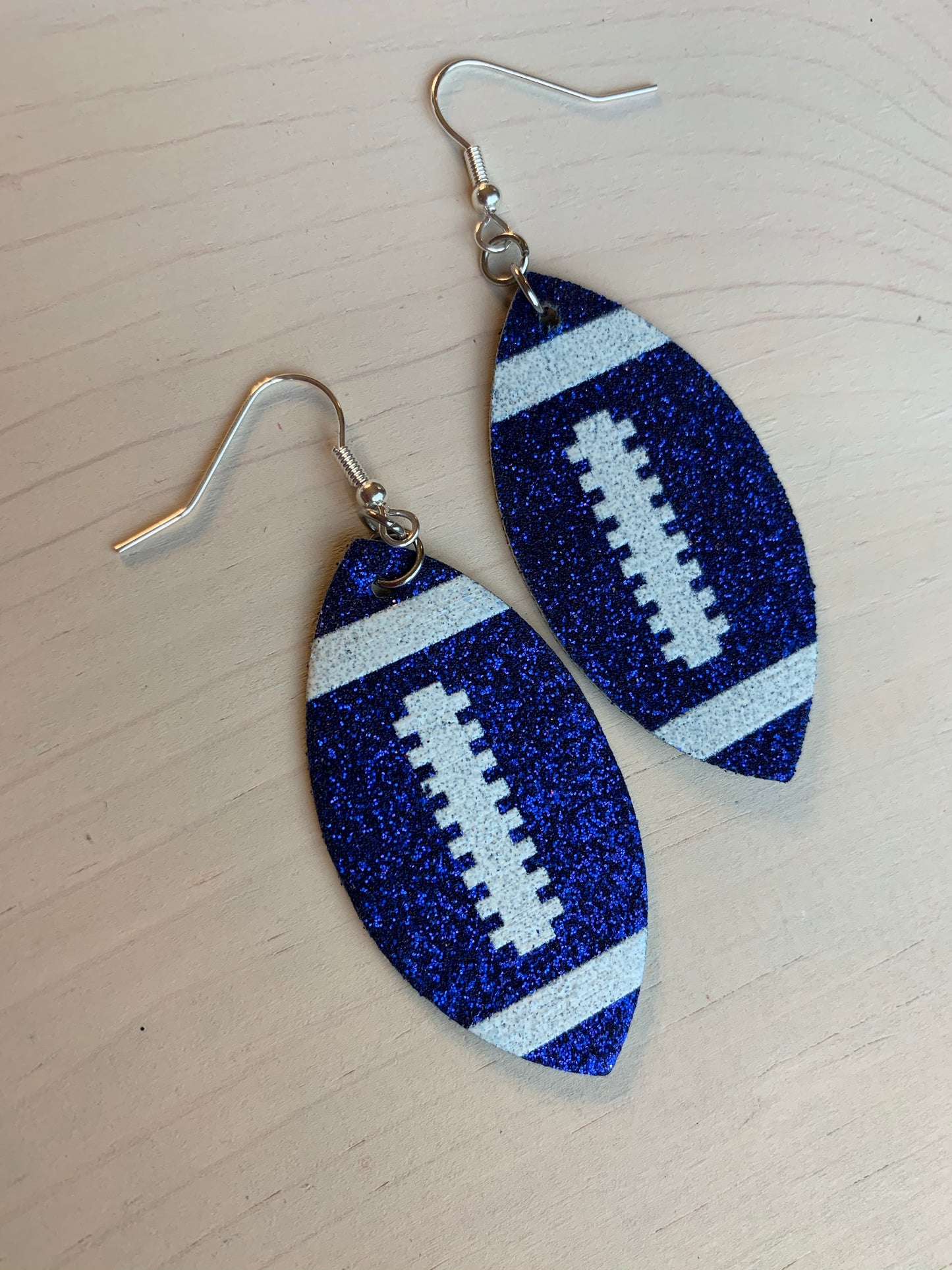 Earrings { Leather } Football. Buffalo plaid. Glitter. Basketball. Baseball. Volleyball. Paisley. Floral. Leopard. Rainbow. Giraffe. $5 jewelry! - Stacy's Pink Martini Boutique