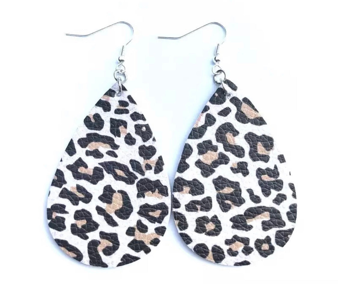 Earrings { Leather } Football. Buffalo plaid. Glitter. Basketball. Baseball. Volleyball. Paisley. Floral. Leopard. Rainbow. Giraffe. $5 jewelry! - Stacy's Pink Martini Boutique