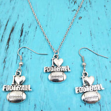 Hats, tanks, shirts, jewelry. { Football } Assorted styles. Football mom, Love me like you love football, Football forever, Tailgate hair don't care. - Stacy's Pink Martini Boutique