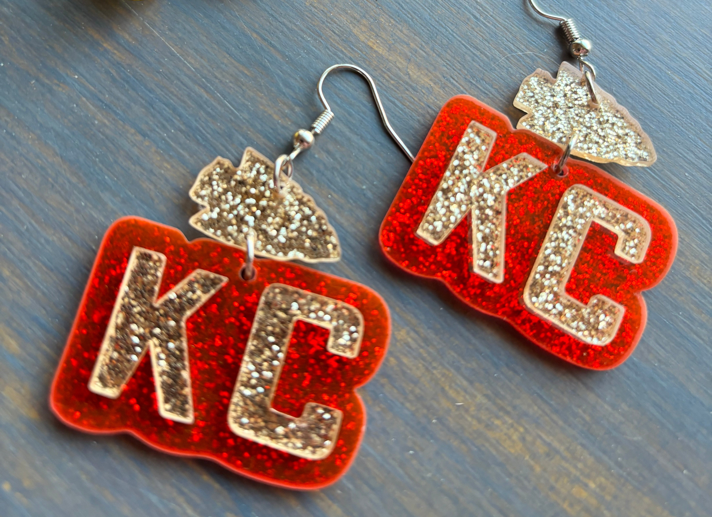 Earrings Assorted styles and colors Christmas Thanksgiving Easter Sports All items posted here in stock and ship same day Stacy's Pink Martini Boutique