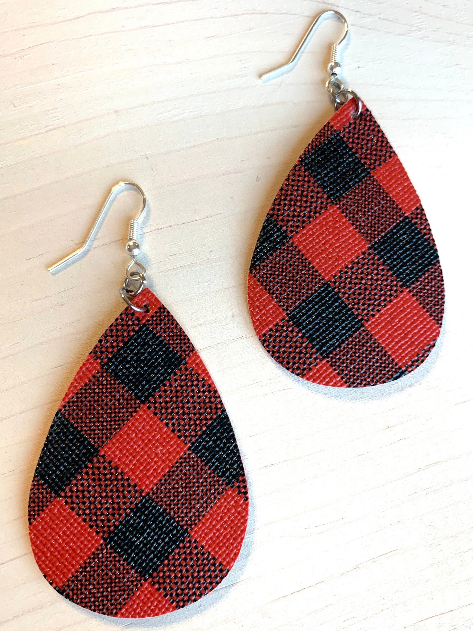 Earrings Assorted styles and colors Christmas Thanksgiving Easter Sports All items posted here in stock and ship same day Stacy's Pink Martini Boutique