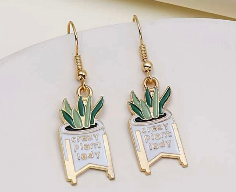 Earrings Assorted styles and colors Christmas Thanksgiving Easter Sports All items posted here in stock and ship same day Stacy's Pink Martini Boutique