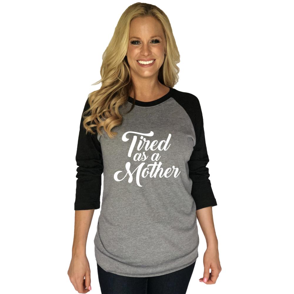 Mom shirts! { Tired as a mother } Raglan • Black and gray. XS-XL. So soft and comfy! Matching hats to complete your look. - Stacy's Pink Martini Boutique