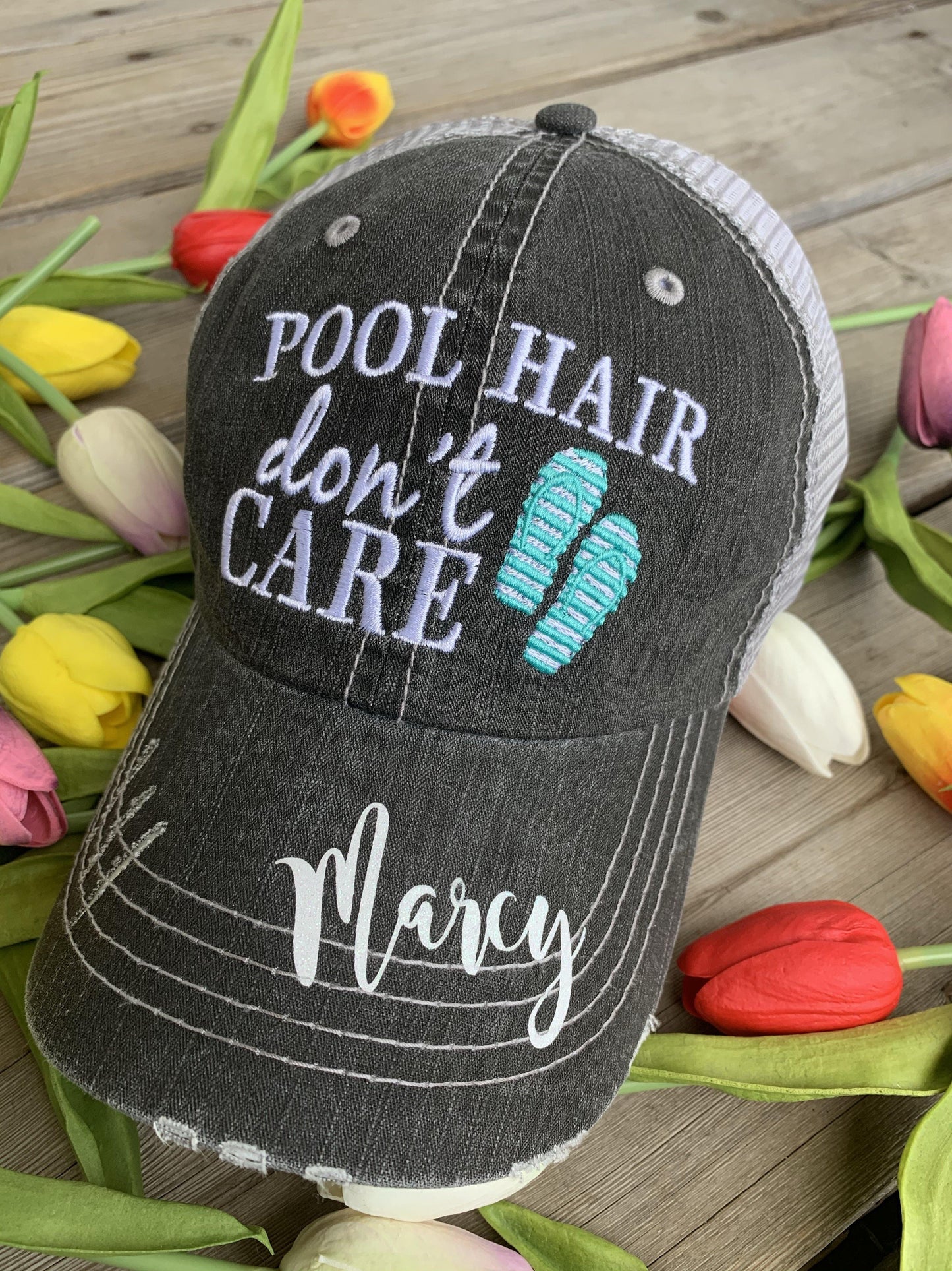 Hats { Cheer mom } Embroidered distressed trucker cap with adjustable Velcro • Pom poms • Gray with pink, teal, purple or red pom poms • Customize with names and numbers - Stacy's Pink Martini Boutique