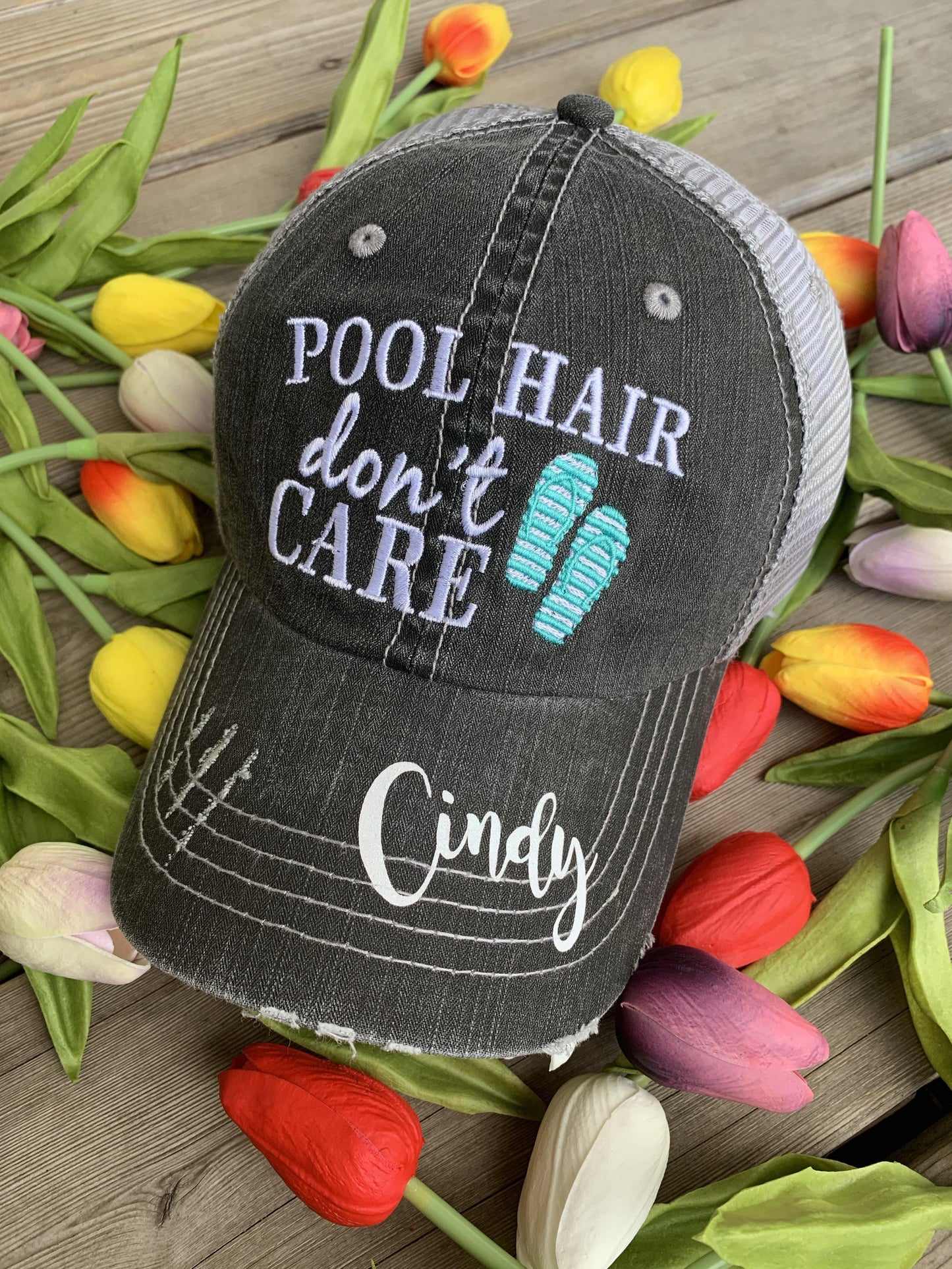 Hats { Cheer mom } Embroidered distressed trucker cap with adjustable Velcro • Pom poms • Gray with pink, teal, purple or red pom poms • Customize with names and numbers - Stacy's Pink Martini Boutique