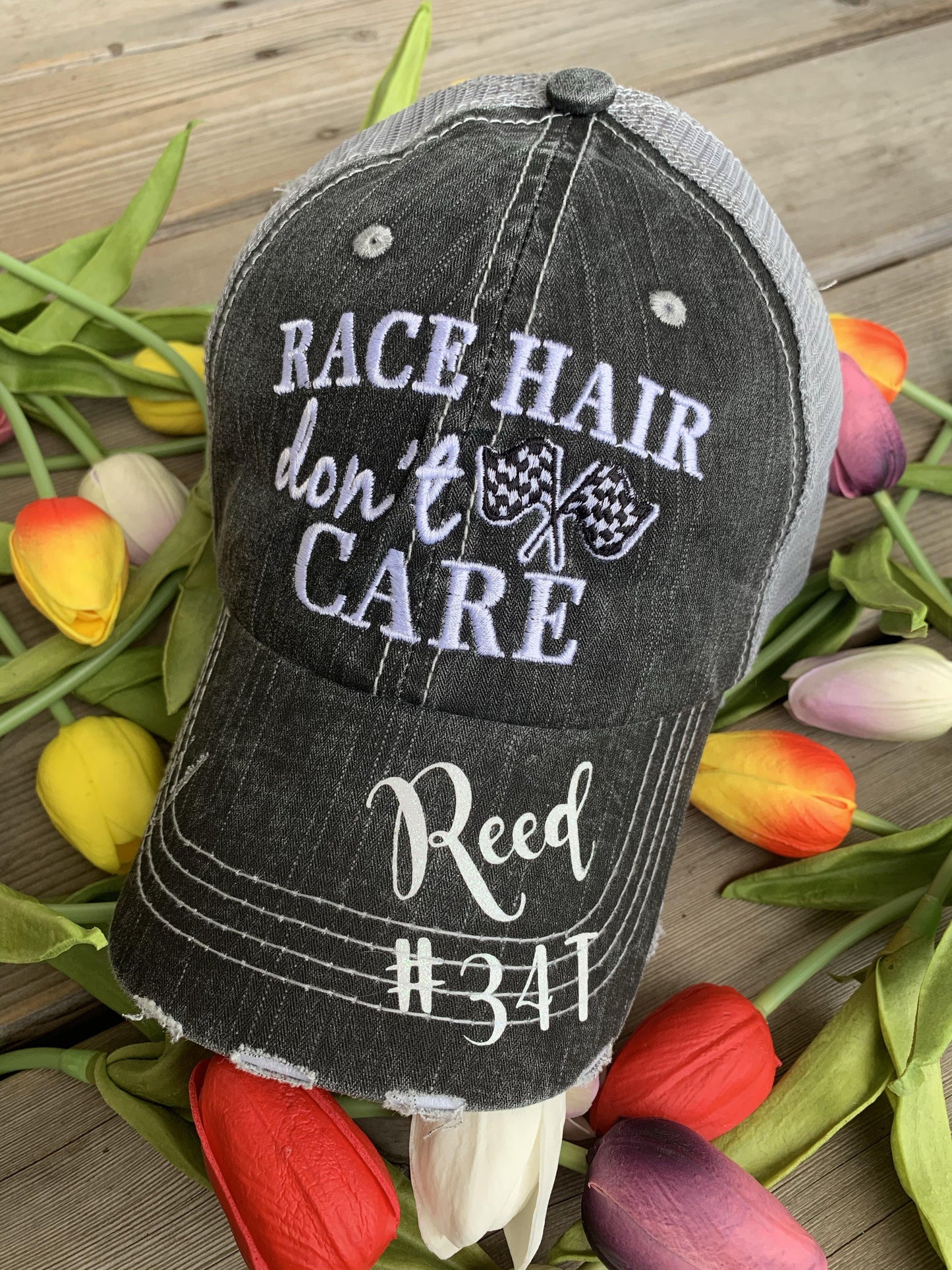 Hats { Cheer mom } Embroidered distressed trucker cap with adjustable Velcro • Pom poms • Gray with pink, teal, purple or red pom poms • Customize with names and numbers - Stacy's Pink Martini Boutique