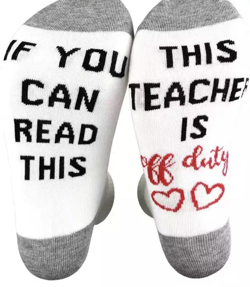 Socks { if you can read this this teacher is off duty } Gray, white with black and red graphics. Heart. NURSE or TEACHER. - Stacy's Pink Martini Boutique