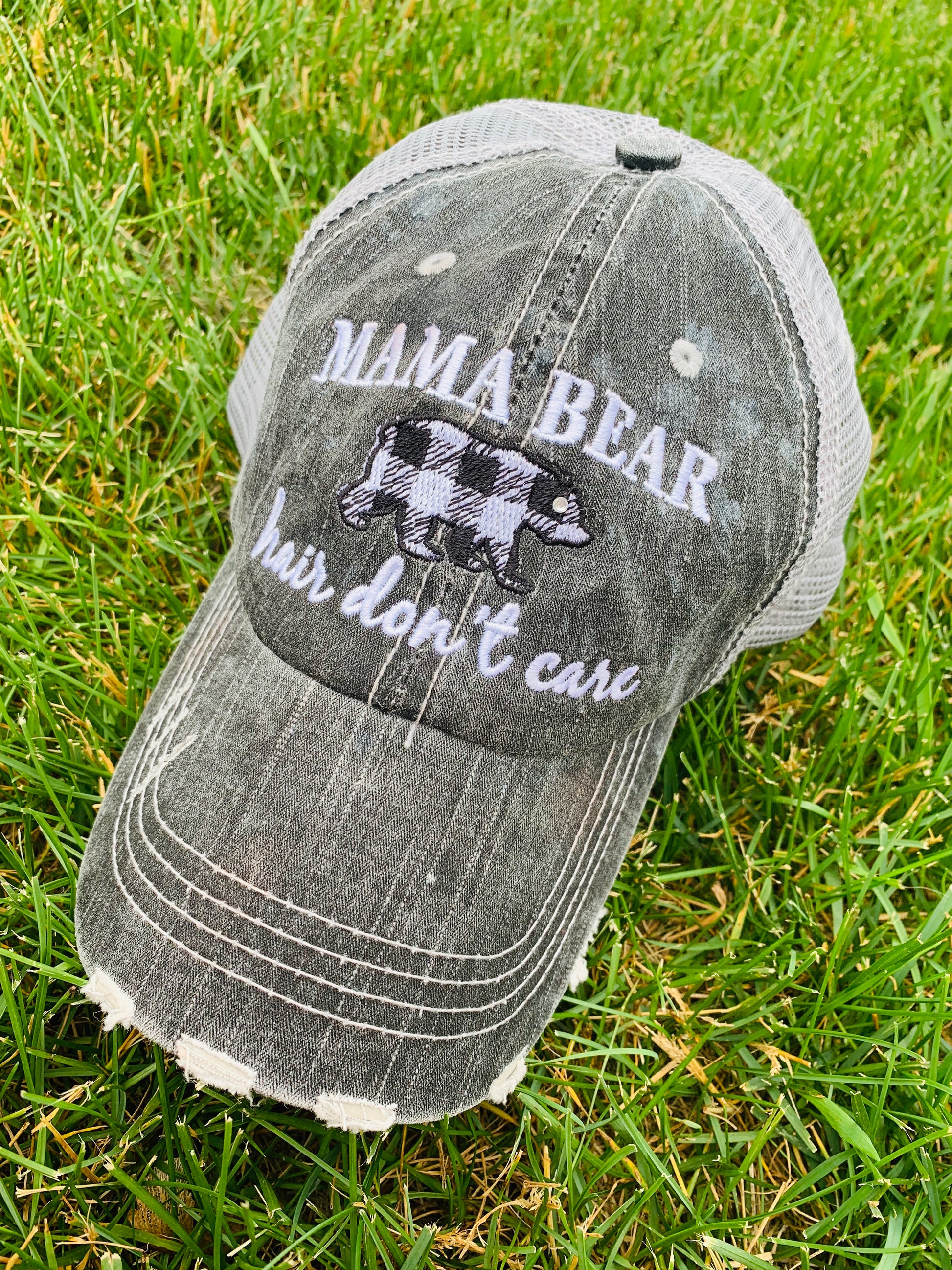 Hats { Mama bear hair dont care } Buffalo plaid, black/white bear • Trucker hat • Distressed • Mom hats • - Stacy's Pink Martini Boutique