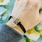 Cross bracelet • Silver • Black cording Adjustable extender Lobster clasp - Stacy's Pink Martini Boutique