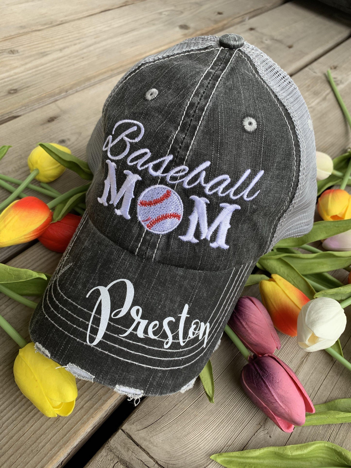 Hats { Cheer mom } Embroidered distressed trucker cap with adjustable Velcro • Pom poms • Gray with pink, teal, purple or red pom poms • Customize with names and numbers - Stacy's Pink Martini Boutique